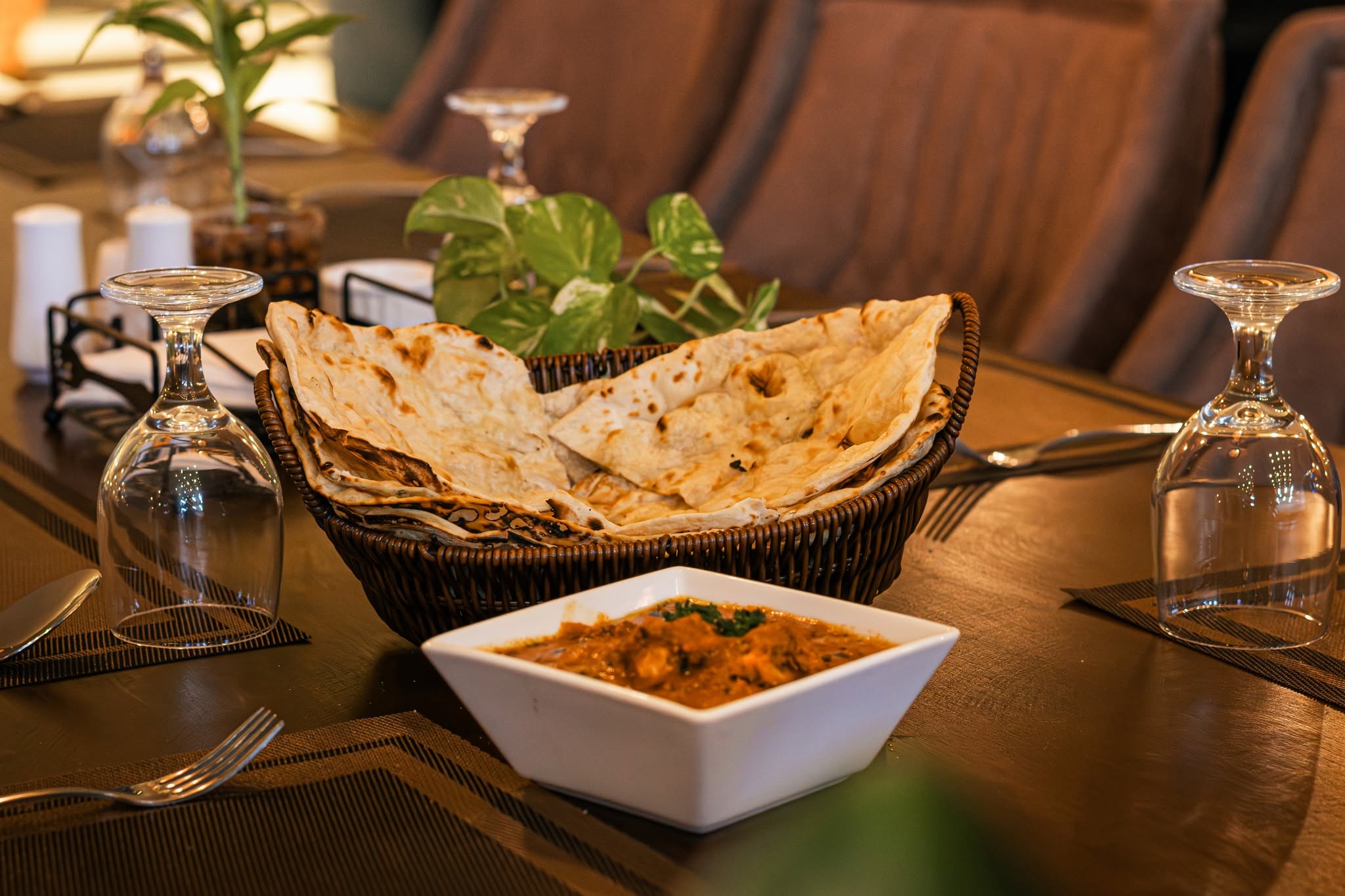 Creamy curry served with naan